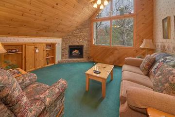 Upstairs Cabin Seating Cabin's upstairs seating with fireplace.